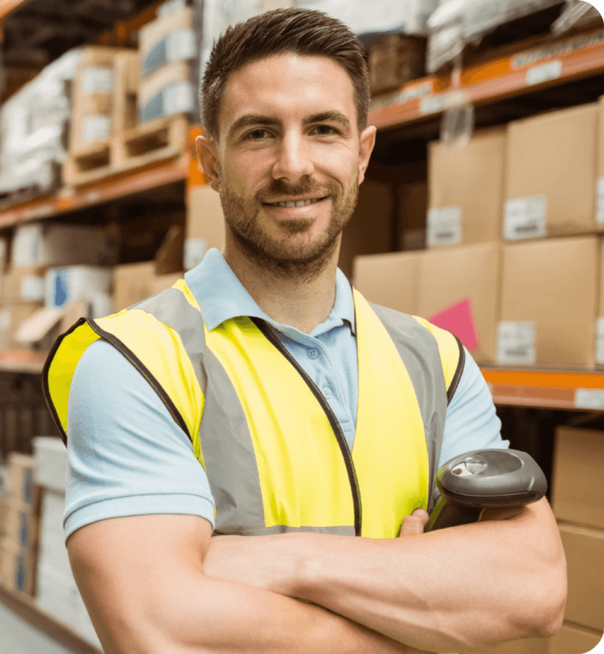 smiling man that works for Trojan in warehouse