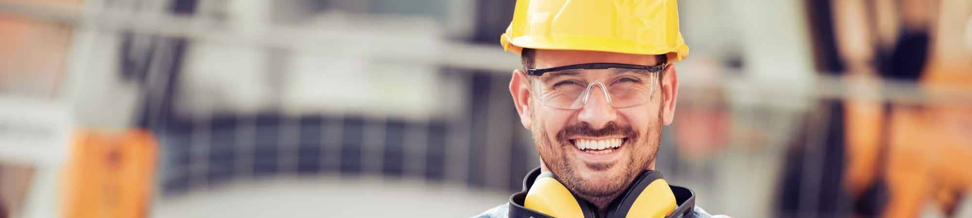smiling man on construction site